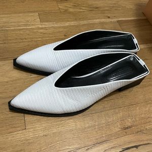 The Kooples White leather mules with snakeskin print. Worn only a few times.